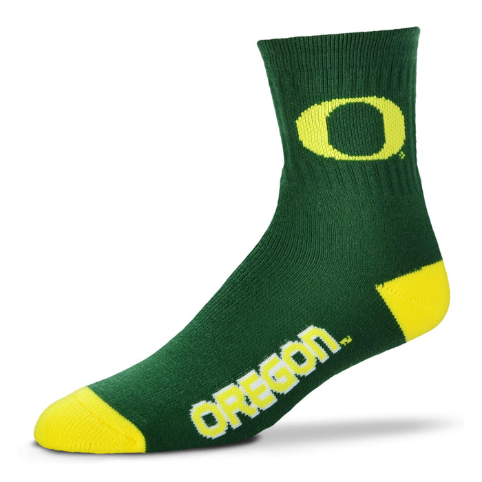 for Bare Feet Oregon Ducks Holiday Pattern Crew Socks Size: Large